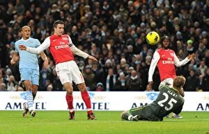 Images Dated 18th December 2011: Robin van Persie's Controversial Goal: Manchester City vs. Arsenal, 2011-12 Premier League