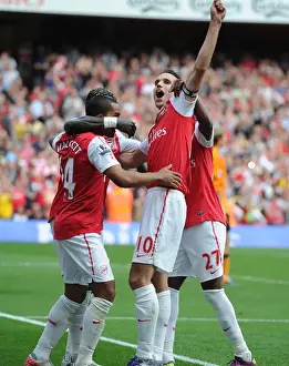 Arsenal V Bolton Wanderers 2011-12 Prints: Robin van Persie's Double Milestone: Centurion Strikes 100th Goal for Arsenal