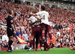 West Ham United v Arsenal 2007-08 Collection: Robin van Persie's Game-Winning Goal: Arsenal's Victory Celebration with Eboue and Fabregas vs