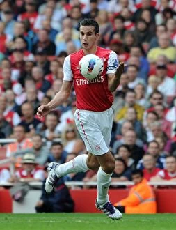 Images Dated 24th September 2011: Robin van Persie's Hat-Trick: Arsenal Crushes Bolton Wanderers 3-0 in Premier League