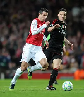 Robin van Persie's Hat-Trick: Arsenal's Triumph over AC Milan in the UEFA Champions League (3-0)