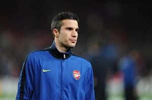Images Dated 8th March 2011: Robin van Persie's Heartbreaking Performance: Arsenal vs. Barcelona, UEFA Champions League 2011