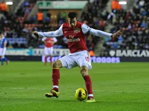 Wigan Athletic V Arsenal 2011-12 Prints: Robin van Persie's Magical Trickery: A Mesmerizing Moment from Wigan Athletic vs