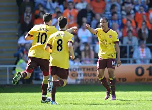 Robin van Persie's Stunner: Theo Walcott and Samir Nasri Celebrate Arsenal's 3-1 Win Over Blackpool