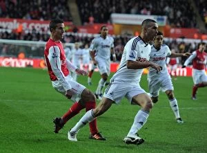 Swansea City v Arsenal 2011-12 Collection: Robin van Persie's Thrilling Goal Past Steven Caulker: Arsenal vs