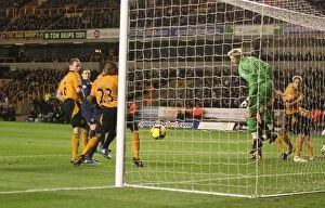 Wolverhampton Wanderers v Arsenal 2009-10 Collection: Ronald Zubar deflects the ball past Wolves goalkeeper