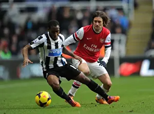 Rosicky vs Anita: Intense Battle in Newcastle United vs Arsenal, Premier League 2013-14