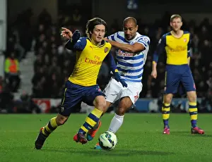 Queens Park Rangers V Arsenal 2014-15 Prints: Rosicky vs. Henry: Intense Battle in Queens Park Rangers vs. Arsenal Premier League Clash