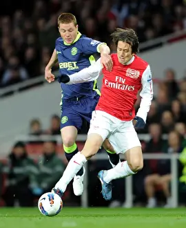 Arsenal V Wigan Athletic 2011-12 Prints: Rosicky vs. McCarthy: A Premier League Clash at Emirates Stadium