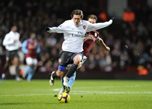 Images Dated 27th January 2010: Rosicky vs. Petrov: A Battle of Midfield Masters at Villa Park (Barclays Premier League, 2010)