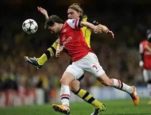 Arsenal v Borussia Dortmund 2013-14 Collection: Rosicky vs. Schmelzer: A Champions League Showdown at the Emirates