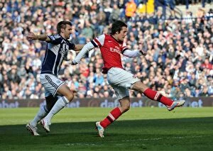 Images Dated 6th April 2013: Rosicky's Dramatic Goal Past McAuley: A Pivotal Moment in the 2012-13 Arsenal-West Brom Clash
