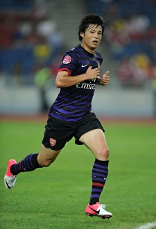 Malaysia XI V Arsenal 2012-13 Prints: Ryo Miyaichi in Action: Arsenal vs Malaysia XI (2012)