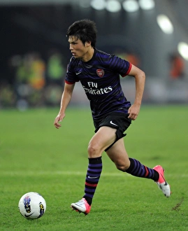 Malaysia XI V Arsenal 2012-13 Prints: Ryo Miyaichi in Action: Arsenal vs Malaysia XI (2012)