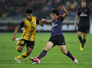 Ryo Miyaichi vs Ahmad Shakir Md Ali: Clash in the 2012-13 Malaysia XI vs Arsenal Match
