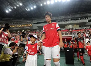 Nagoya Grampus V Arsenal 2013-14 Prints: Ryo Miyaichi's Return: Arsenal's Pre-Season Encounter with Nagoya Grampus in Japan
