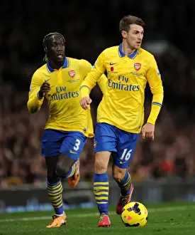 Manchester United V Arsenal 2013-14 Prints: Sagna and Ramsey: Arsenal's Unyielding Duo at Old Trafford (Manchester United v Arsenal 2013-14)