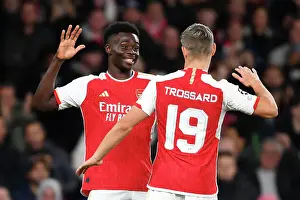 Arsenal V Sevilla 2023-24 Prints: Saka Brace: Arsenal Takes 2-0 Lead Over Sevilla in Champions League