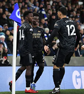 Saka, Nketiah, and Saliba: Arsenal's Triple Threat Celebrates First Goal in Brighton Victory (Brighton & Hove Albion vs Arsenal, 2022-23 Premier League)