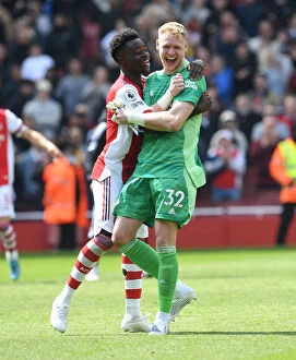 Images Dated 23rd April 2022: Saka and Ramsdale's Thrilling Victory: Arsenal Triumphs Over Manchester United