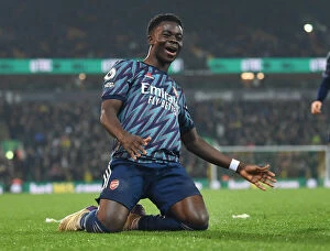 Images Dated 26th December 2021: Saka Scores Double: Arsenal Triumphs over Norwich City in Premier League Clash