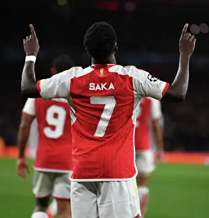 Saka Scores First Champions League Goal: Arsenal Secures Victory Over PSV Eindhoven (2023-24)