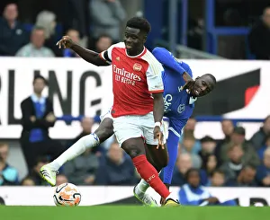 Everton V Arsenal 2023-24 Prints: Saka Scores Past Doucoure: Everton vs. Arsenal, Premier League 2023-24