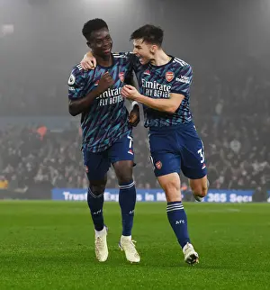 Saka and Tierney Celebrate Arsenal's 3rd Goal vs Leeds United (Premier League 2021-22)
