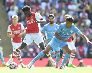 Manchester City V Arsenal 2021-22 Prints: Saka vs Cancelo: A Premier League Showdown - Manchester City vs Arsenal (2021-22)