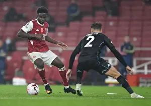 Arsenal V Aston Villa 2020-21 Prints: Saka vs. Cash: A Premier League Face-Off at Emirates Stadium