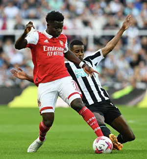 Saka vs. Isak: A Wingers Clash at St. James Park - Arsenal vs. Newcastle United (2022-23)