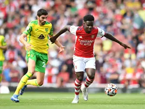 Arsenal V Norwich City 2021-22 Prints: Saka vs Lees-Melou: A Premier League Battle at the Emirates