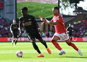 Saka vs. Lodi: Intense Battle in Nottingham Forest vs. Arsenal Premier League Clash