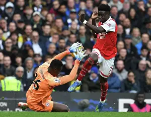 Saka vs. Mendy: A Premier League Battle at Stamford Bridge