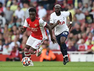 Arsenal V Tottenham Hotspur 2021-22 Prints: Saka vs. Ndombele: A Premier League Showdown at Emirates Stadium