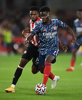 Saka vs. Onyeka: A Premier League Battle at Brentford Community Stadium