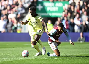 Saka vs. Ramsey: A Premier League Battle at Villa Park