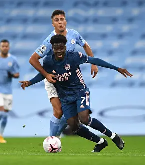 Saka vs Rodrigo: A Premier League Battle at Etihad Stadium (2020-21)