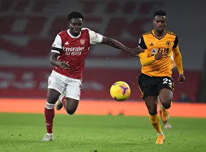 Saka vs. Semedo: A Battle at Empty Emirates - Arsenal vs. Wolverhampton Wanderers (2020-21)
