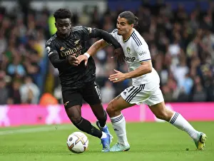 Saka vs Struijk: A Premier League Battle - Arsenal's Bukayo Saka Goes Head-to-Head with Leeds Pascal Struijk