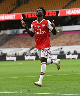 Saka's Stunner: Arsenal's Victory at Wolverhampton Wanderers (2019-2020)
