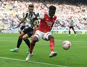 Newcastle United V Arsenal 2022-23 Prints: Saka's Unyielding Spirit: Arsenal's Triumph Over Newcastle United
