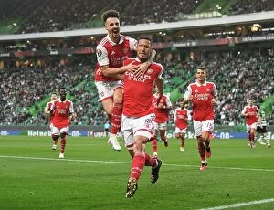 Sporting Lisbon v Arsenal 2022-23 Collection: Saliba and Vieira's Europa League Goal Celebration: Arsenal's Unforgettable Moment in Lisbon