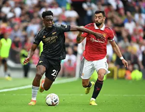 Manchester United V Arsenal 2022-23 Prints: Sambi of Arsenal Breaks Past Bruno Fernandes: Manchester United vs