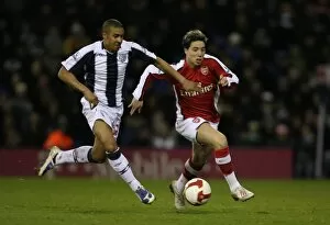 Images Dated 3rd March 2009: Sami Nasri (Arsenal) Gianni Zuiverloon (West Brom)