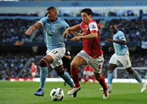 Manchester City v Arsenal 2010-11 Collection: Sami Nasri (Arsenal) Jerome Boateng (Man City). Manchester City 0: 3 Arsenal