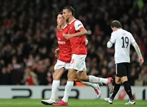 Sami Nasri celebrates scoring the 2nd Arsenal goal with Marouane Chamakh