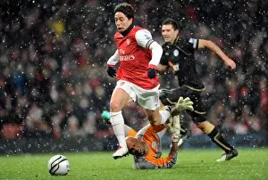 Images Dated 30th November 2010: Samir Nasri (Arsenal) Ali Al Habsi (Wigan). Arsenal 2: 0 Wigan Athletic