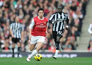 Arsenal v Newcastle United 2010-11 Collection: Samir Nasri (Arsenal) Cheik Tiote (Newcastle). Arsenal 0: 1 Newcastle United