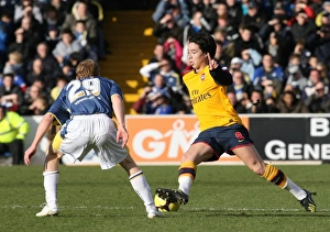 Cardiff City V Arsenal FA Cup Prints: Samir Nasri (Arsenal) Chris Burke (Cardiff City)